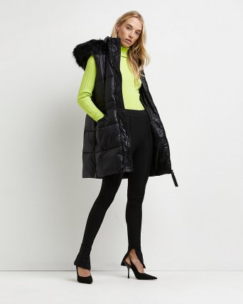 River Island Black padded longline gilet – womens puffer style gilets with faux fur lined hood