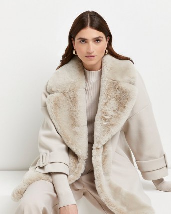 River Island Cream faux fur trim swing coat – women’s luxe style winter coats