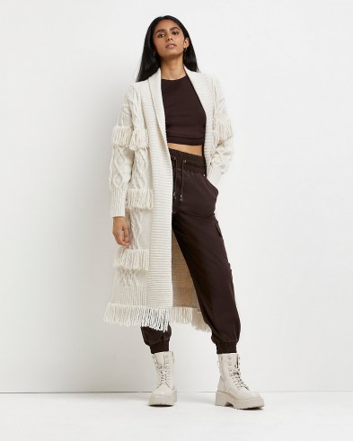 River Island Cream fringe detail cable knit cardigan | longline open front fringed cardigans | Western boho inspired knitwear
