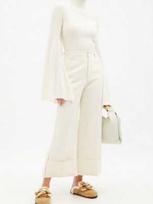 JW ANDERSON Bell-sleeve cotton-knit ribbed sweater | white high neck flared sleeve sweaters | split wide sleeved jumpers | feminine knitwear - flipped