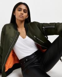 River Island Khaki bomber jacket | womens green zip detail on-trend jackets