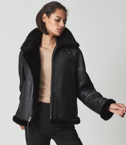 REISS MACEY REVERSIBLE SHEARLING AVIATOR JACKET BLACK ~ womens responsibly sourced leather jackets ~ women’s luxe winter outerwear - flipped