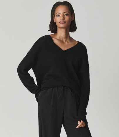 Reiss ROSA V NECK CASHMERE JUMPER BLACK | womens drop shoulder jumpers | women’s luxe knitted pullovers - flipped