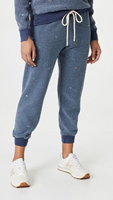 THE GREAT. The Sherpa Cropped Sweatpants with Ditsy Floral Embroidery Vintage Navy / womens blue cuffed joggers / fluffy textured jogging bottoms - flipped