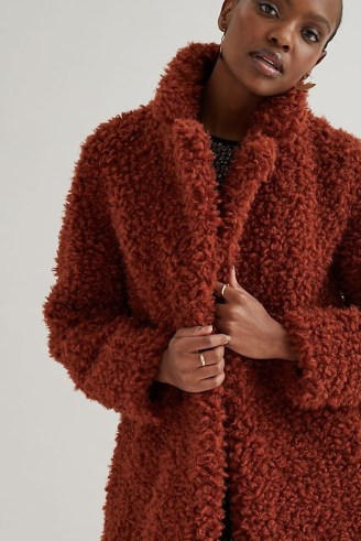 ANTHROPOLOGIE High-Neck Teddy Coat in Terracotta / orange-brown textured coats / faux fur winter coats