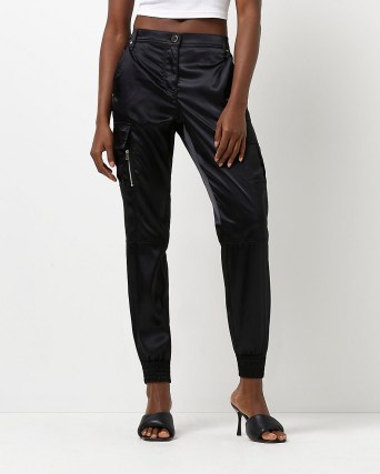 RIVER ISLAND BLACK SATIN CARGO TROUSERS ~ womens cuffed sports luxe pants - flipped