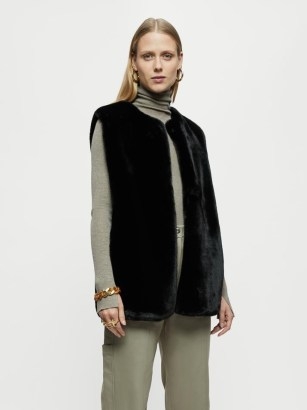 JIGSAW Faux Fur Gilet in Black / womens fluffy luxe style gilets / women’s glamorous winter sleeveless jackets - flipped