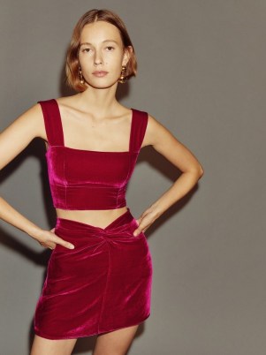Reformation Harri Velvet Skirt in Rhubarb – luxe front knot mini skirts – evening fashion - flipped