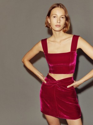 Reformation Harri Velvet Skirt in Rhubarb – luxe front knot mini skirts – evening fashion
