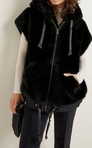 Bogner Ivy Faux Fur Hooded Vest in Black – chic fluffy cap sleeve jackets – womens winter outerwear – women’s stylish gilets - flipped