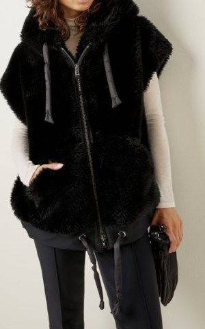 Bogner Ivy Faux Fur Hooded Vest in Black – chic fluffy cap sleeve jackets – womens winter outerwear – women’s stylish gilets