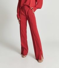REISS LEAH WIDE LEG TAILORED TROUSERS RED / chic split hem pants / womens stylish front seam trousers