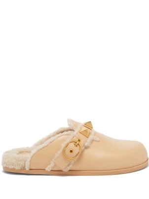 VALENTINO GARAVANI Roman Stud shearling backless loafers in beige | luxe style casual flat mules - flipped