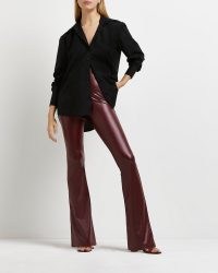 River Island RED MATT COATED FLARED TROUSERS | retro flares