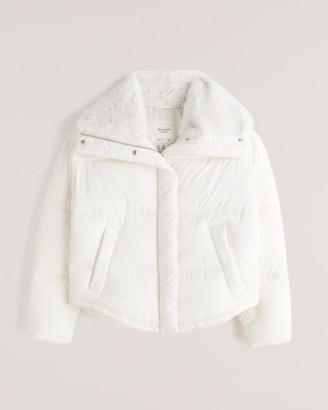 A&F Elevated Mini Puffer – white faux fur collar jackets – curved hem – on trend wind and water resistant outerwear