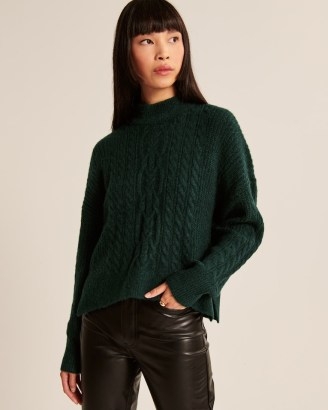 ABERCROMBIE & FITCH Cable Wedge Mockneck Sweater ~ womens dark green relaxed fit sweaters ~ womens high neck side slit jumpers ~ women’s on-trend winter knitwear - flipped
