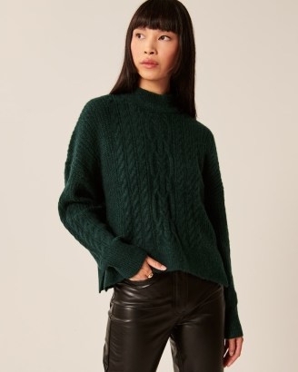 ABERCROMBIE & FITCH Cable Wedge Mockneck Sweater ~ womens dark green relaxed fit sweaters ~ womens high neck side slit jumpers ~ women’s on-trend winter knitwear