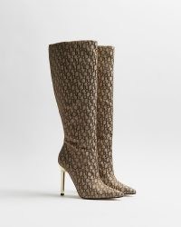 RIVER ISLAND BEIGE RI MONOGRAM JACQUARD HEELED BOOTS / womens logo print gold stiletto heel boots