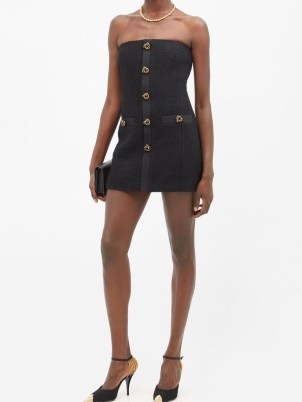 SAINT LAURENT Button-embellished wool-blend bouclé mini dress – strapless LBD – tweed inspired evening dresses – designer occasion fashion – high octane party clothing - flipped