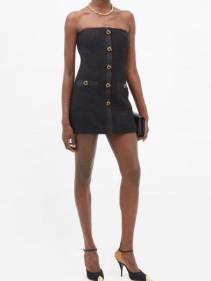 SAINT LAURENT Button-embellished wool-blend bouclé mini dress – strapless LBD – tweed inspired evening dresses – designer occasion fashion – high octane party clothing