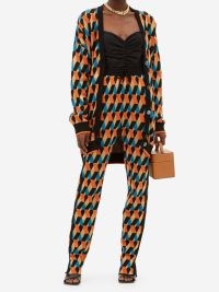 LA DOUBLEJ Diamond-jacquard knit trousers | womens knitted retro patterned pants | women’s vintage style geo printed fashion | black, orange, yellow and blue geometric prints