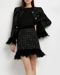 RIVER ISLAND BLACK FEATHER HEM BOUCLE MINI SKIRT ~ textured tweed style skirts