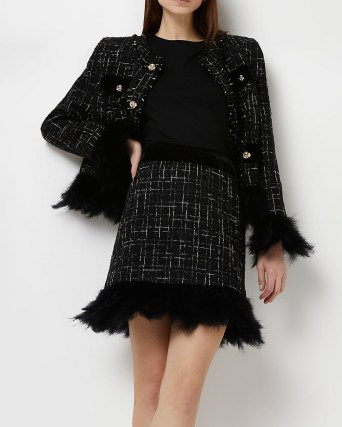 RIVER ISLAND BLACK FEATHER HEM BOUCLE MINI SKIRT ~ textured tweed style skirts - flipped