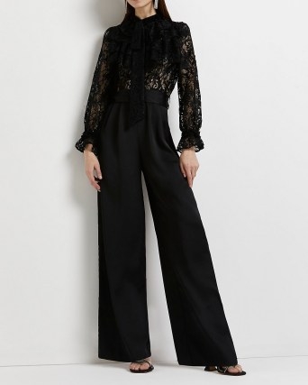 RIVER ISLAND BLACK LACE WIDE LEG JUMPSUIT / semi sheer evening occasion jumpsuits / feminine and romantic party fashion - flipped