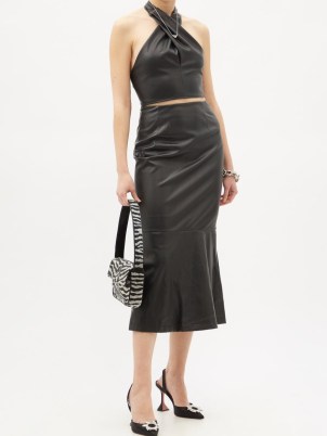 STAUD Laurel black faux-leather fishtail skirt – tiered hem evening skirts – mermaid style hemlines - flipped