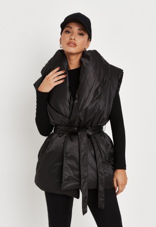 MISSGUIDED black shawl collar belted puffer gilet – padded tie waist gilets – womens sleeveless winter jackets - flipped