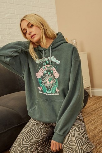 UO Cosmic Vibes Hoodie in Khaki ~ womens green graphic and slogan print pullover hoodies ~ women’s on-trend oversized hooded tops