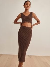 REFORMATION Lieta Open Knit Two Piece in Chestnut ~ chic knitted fashion sets ~ brown fringed midi skirt and crop top co ord ~ womens on trend clothing co ords