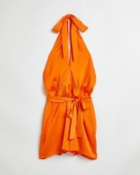 RIVER ISLAND ORANGE SATIN HALTER NECK PLAYSUIT / bright halterneck party playsuits / on-trend going out evening fashion