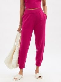 EXTREME CASHMERE No.56 Yogi stretch-cashmere track pants in hot pink | womens luxe knitted joggers | chic jogging bottoms