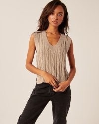 Abercrombie & Fitch Cropped V-Neck Sweater Vest – light brown knitted tanks – side slit cable knit tanks – women’s fashionable knitwear – womens on trend sleeveless vest tops