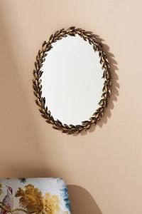 ANTHROPOLOGIE Calluna Wall Mirror Bronze ~ oval statement mirrors ~ floral themed home furnishings