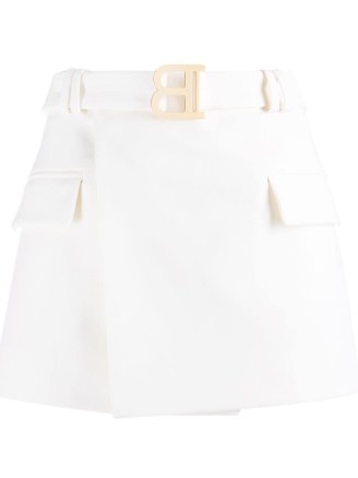 Balmain wraparound white cotton utility skirt. DESIGNER POCKET DETAIL MINI SKIRTS - flipped