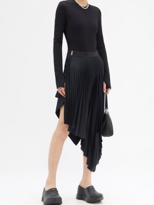 GIVENCHY Asymmetric hem pleated midi skirt in black – chic contemporary designer skirts - flipped