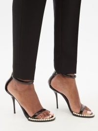 DOLCE & GABBANA Faux pearl-embellished black leather sandals – glamorous barely there high heels – designer ankle strap stilettos