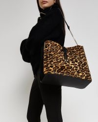 River Island BROWN LEATHER LEOPARD PRINT SLOUCH BAG | wild cat print shoulder bags | animal prints