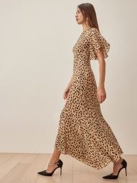REFORMATION Carletta Dress in Bobcat ~ wild animal prints ~ glamorous cat print fashion ~ ankle length flutter sleeve occasion dresses ~ asymmetric hemline