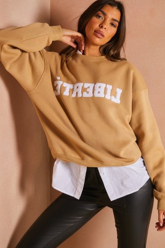 LORNA LUXE TAN TEDDY BORG ‘LIBERTE’ APPLIQUE OVERSIZED SWEATSHIRT ~ light brown slogan sweatshirts ~ womens celebrity inspired sweat tops - flipped