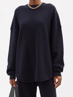 EXTREME CASHMERE No. 53 Crew Hop stretch-cashmere sweater in navy / womens chic drop shoulder curved hem sweaters / women’s dark blue luxury knitwear