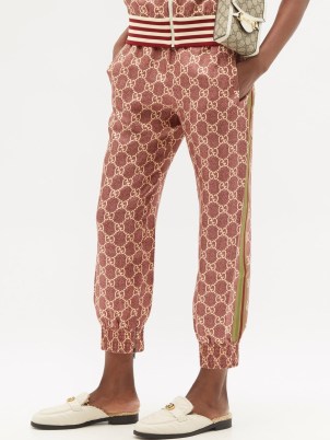 GUCCI Cropped GG-Supreme silk-twill trousers in red / women’s sportswear inspired fashion / sports luxe pants / womens casual designer clothing - flipped