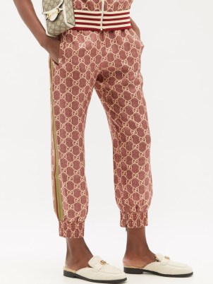 GUCCI Cropped GG-Supreme silk-twill trousers in red / women’s sportswear inspired fashion / sports luxe pants / womens casual designer clothing