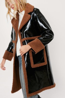NASTY GAL Vinyl Faux Fur Trimmed Midi Jacket in black ~ women’s high shine winter coats