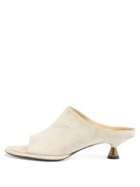KHAITE Watts cone-heel suede mules in ivory / peep toe kitten heels