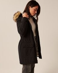ABERCROMBIE & FITCH Faux Fur-Lined Military Parka in Black / womens parkas / women’s casual on-trend winter coats