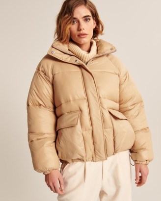 ABERCROMBIE & FITCH Oversized Utility Puffer in Light Brown ~ womens on-trend padded coats ~ women’s fashionable winter jackets