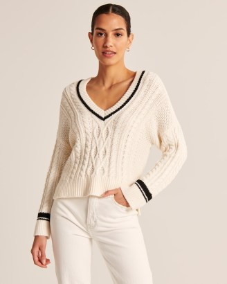 Abercrombie & Fitch Tipped Slouchy Cable V-Neck Sweater | womens off white cricket style jumpers | women’s soft knit sweaters
